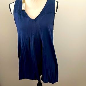 Ladies long pleated tank top with lace detail on the shoulders